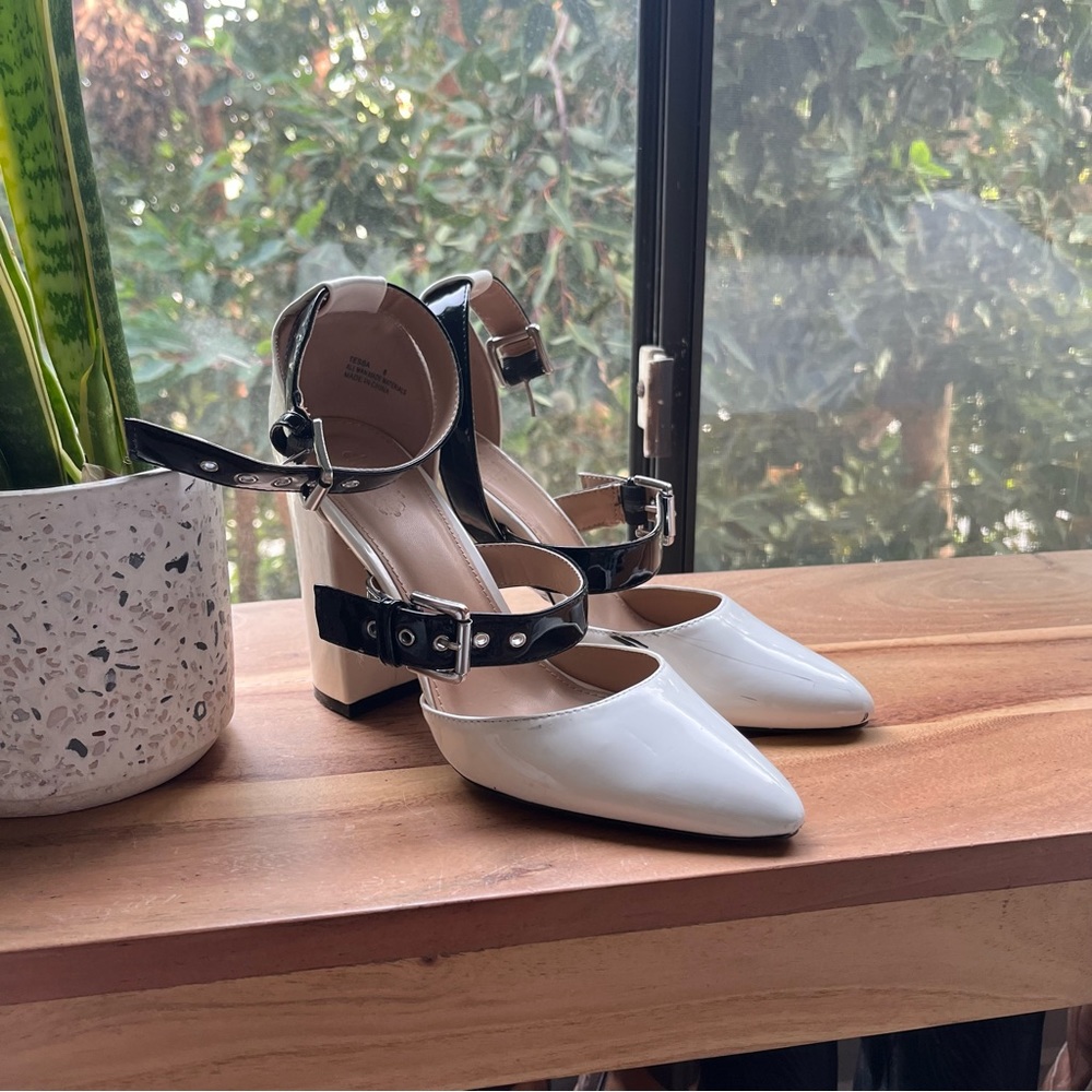 White & black heels